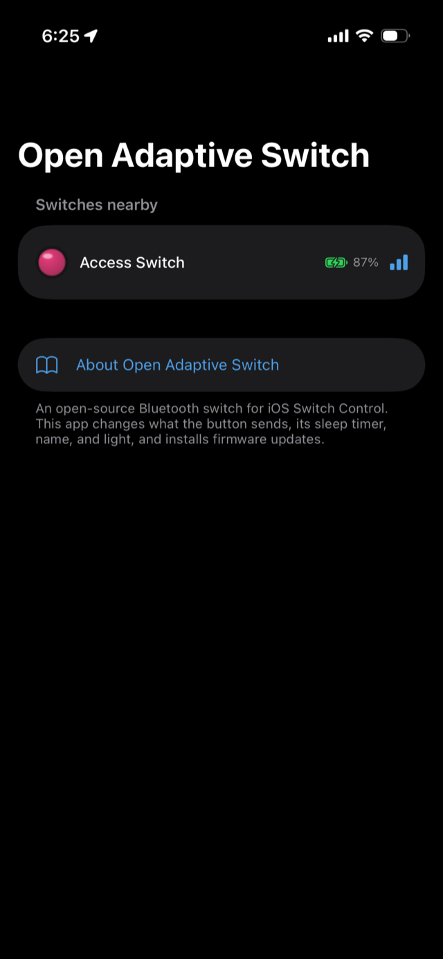 The OpenAdaptive Switch iPhone app showing a nearby switch named Access Switch with an 87 percent battery and a pink button icon